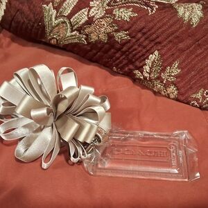 Coach Metallic Silver Bow Keychain